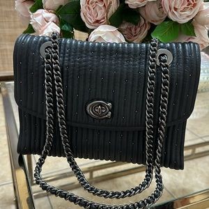 Coach Parker Quilting with studs details.